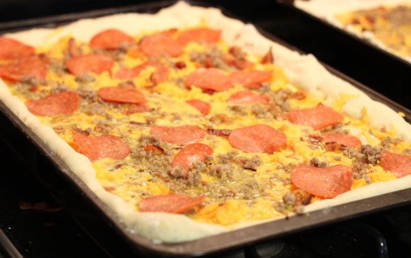 One the prep is done, the breakfast pizzas come together quickly.