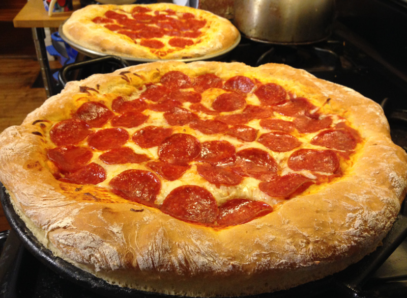Why order out when you can make chewy, gooey, delicious pizza for pennies at home?
